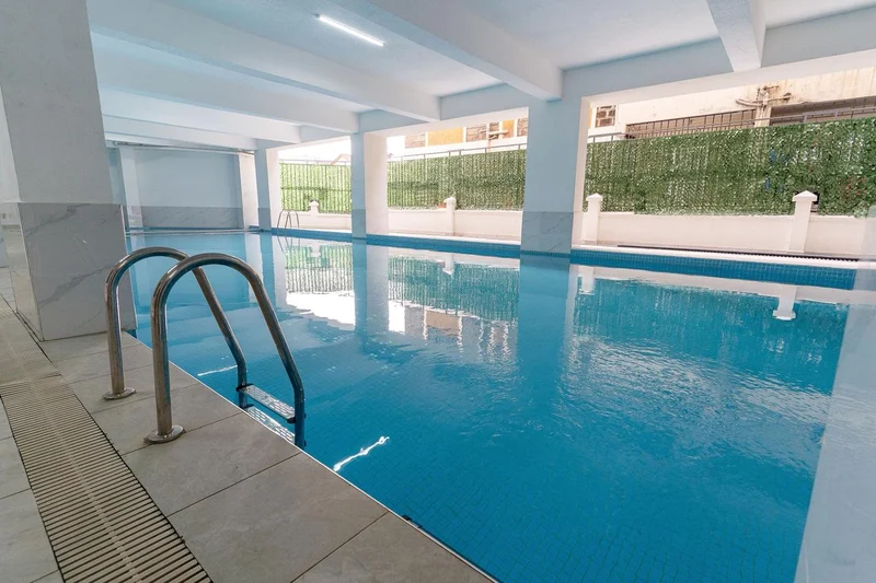 One bedroom with heated pool and gym