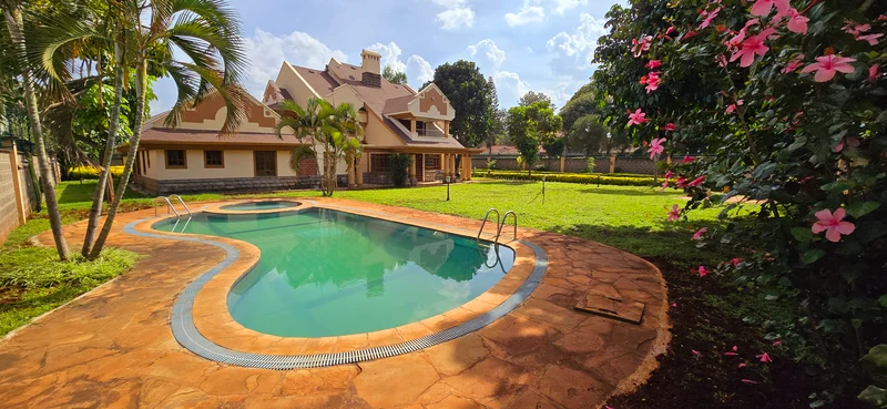 5-bedroom home, nestled in a serene and private setting