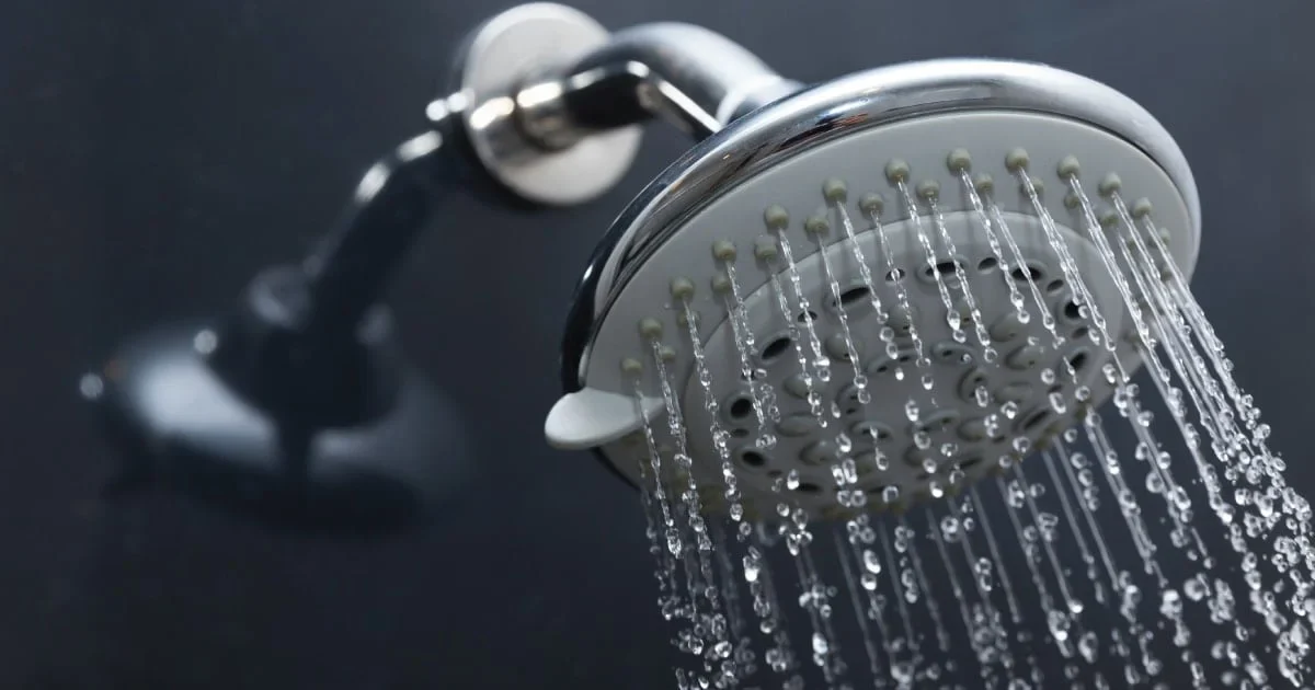 soaking shower head in vinegar